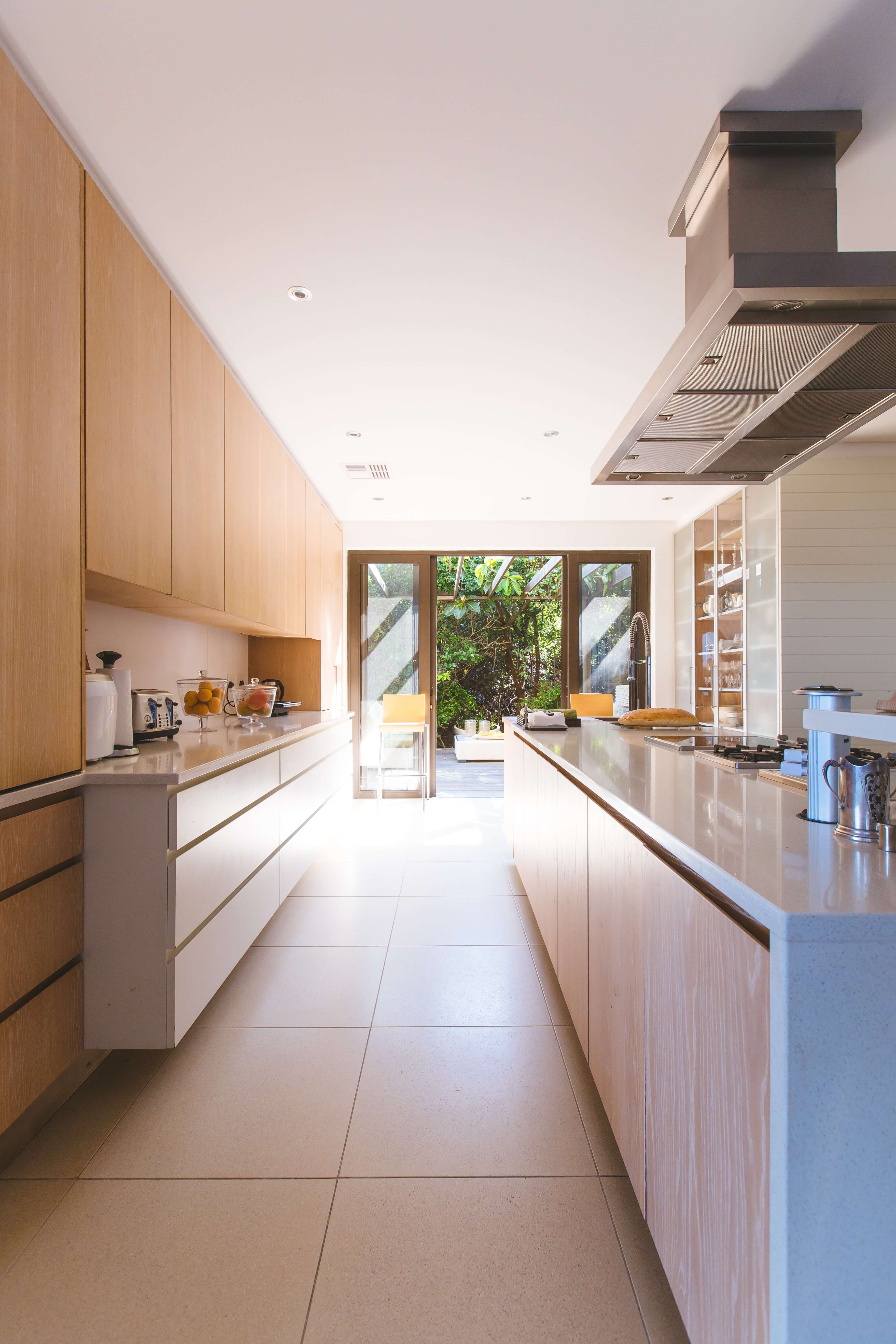 Open concept kitchen with sliding french doors